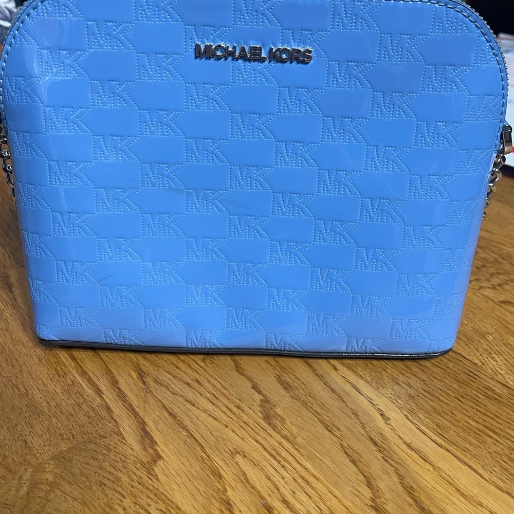 Michael Kors, blue clamshell bag. 6 1/2 length, 8/12 width
